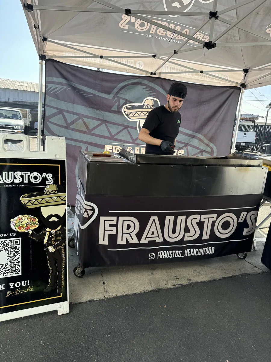 Cooking birria at the Frausto's cart